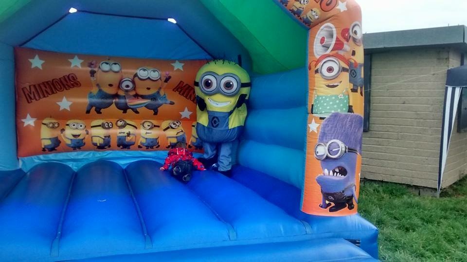 A bouncy castle for hire in Ballywalter, with a Minion costume! Ballywalter bouncy castle hire